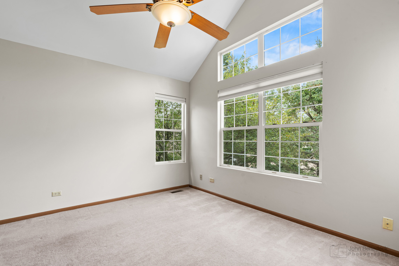 115 Ione Drive, Unit E South Elgin, IL 60177 - Photo 19 of 29 an empty room with windows