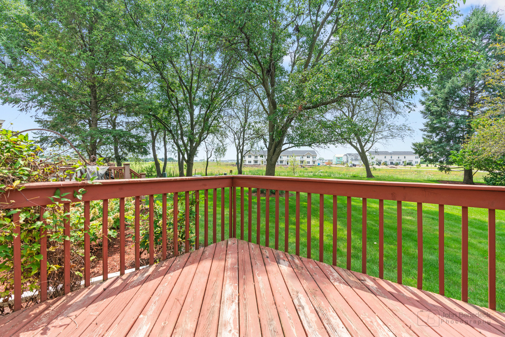 115 Ione Drive, Unit E South Elgin, IL 60177 - Photo 22 of 29 a view of balcony with wooden floor and fence