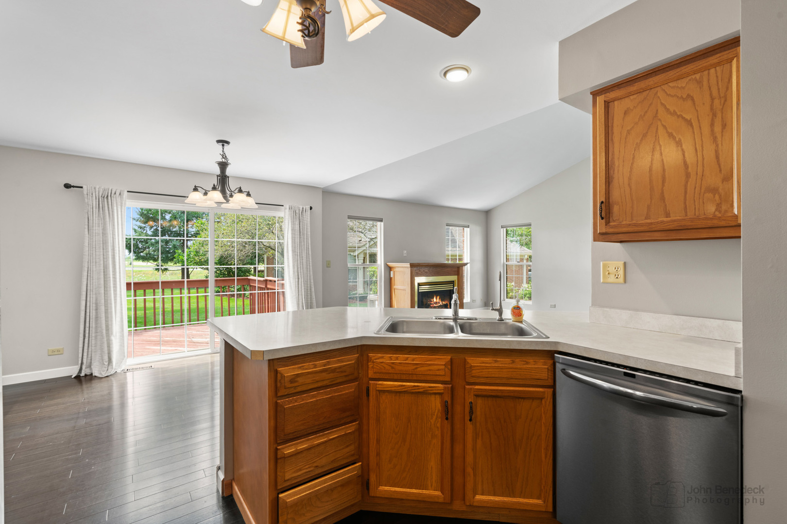 115 Ione Drive, Unit E South Elgin, IL 60177 - Photo 10 of 29 a kitchen with a sink stove and microwave