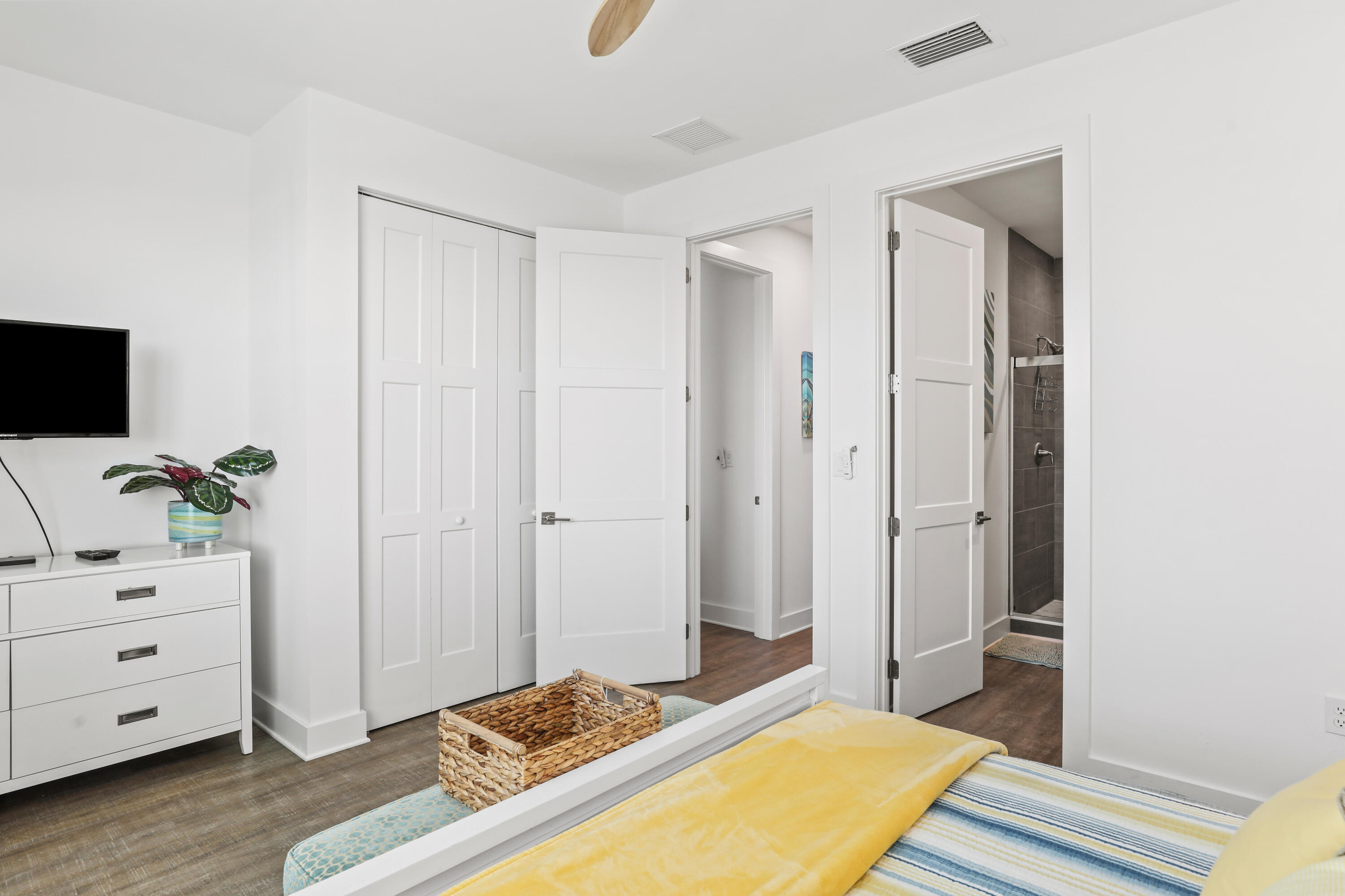 1140 92nd Street Marathon, FL 33050 - Photo 15 of 32 a bedroom with a bed and a dresser in it