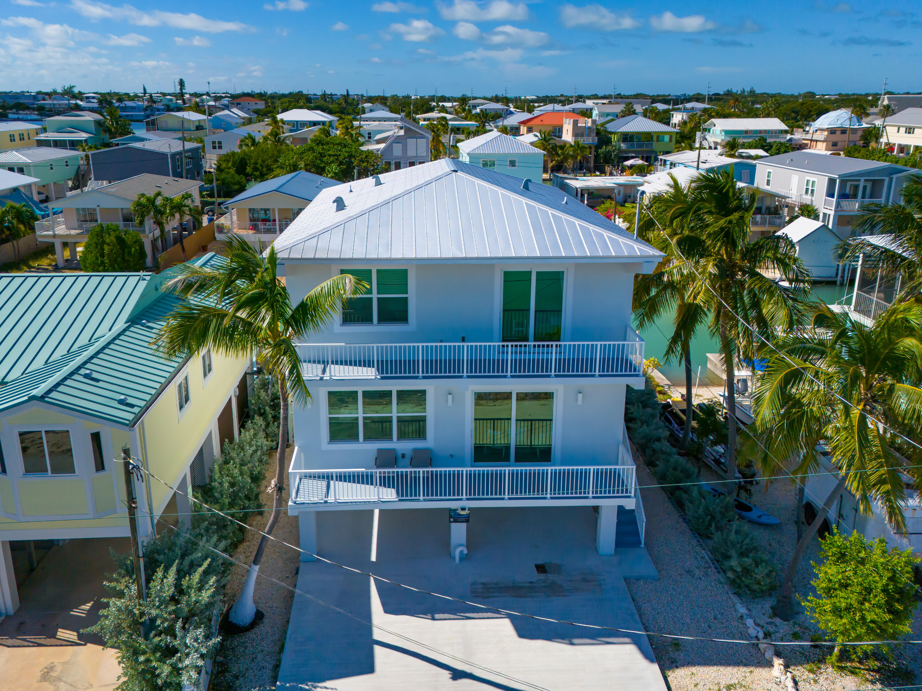 1140 92nd Street Marathon, FL 33050 - Photo 23 of 32 an aerial view of multiple house