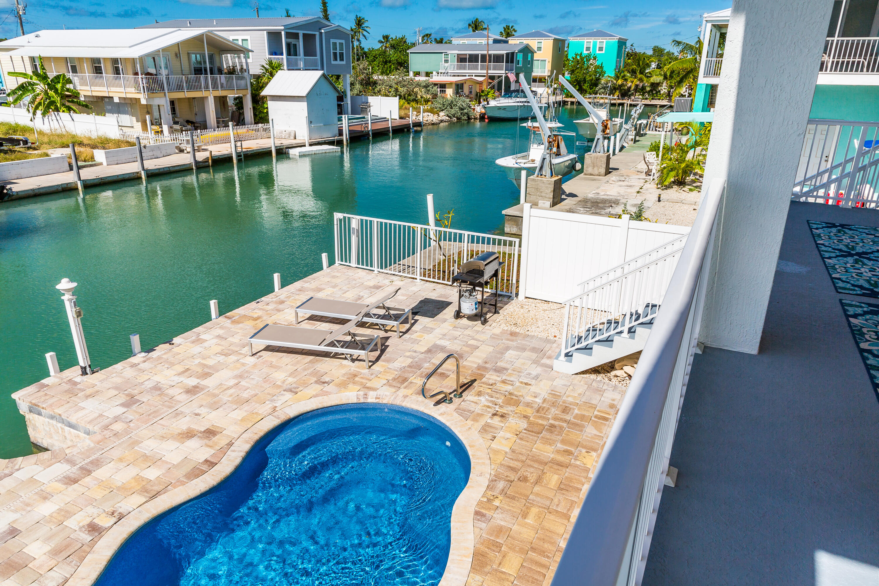 1140 92nd Street Marathon, FL 33050 - Photo 3 of 32 a view of a lake with a house
