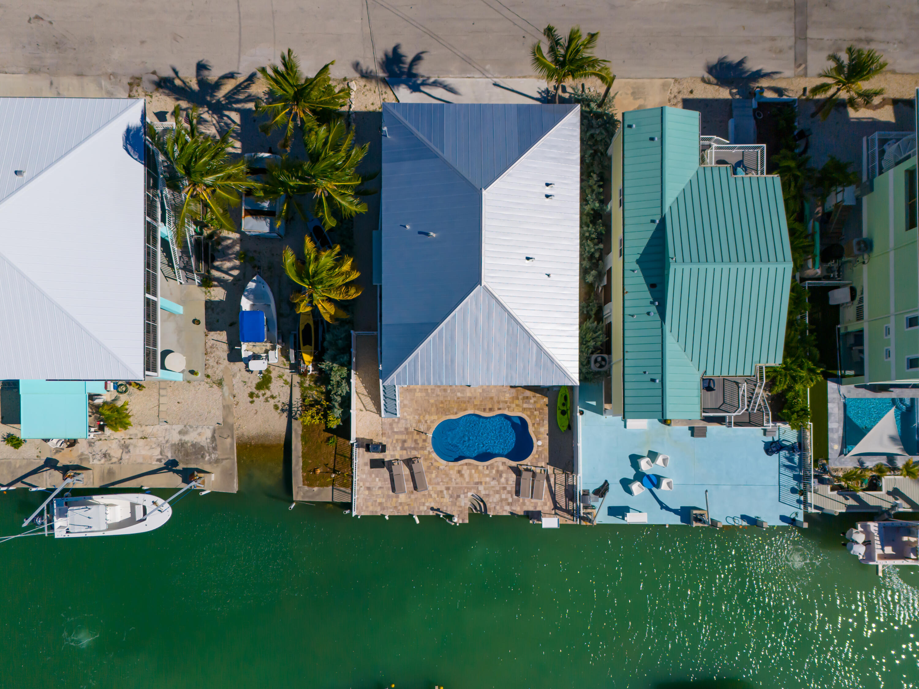 1140 92nd Street Marathon, FL 33050 - Photo 4 of 32 a house view with a garden space