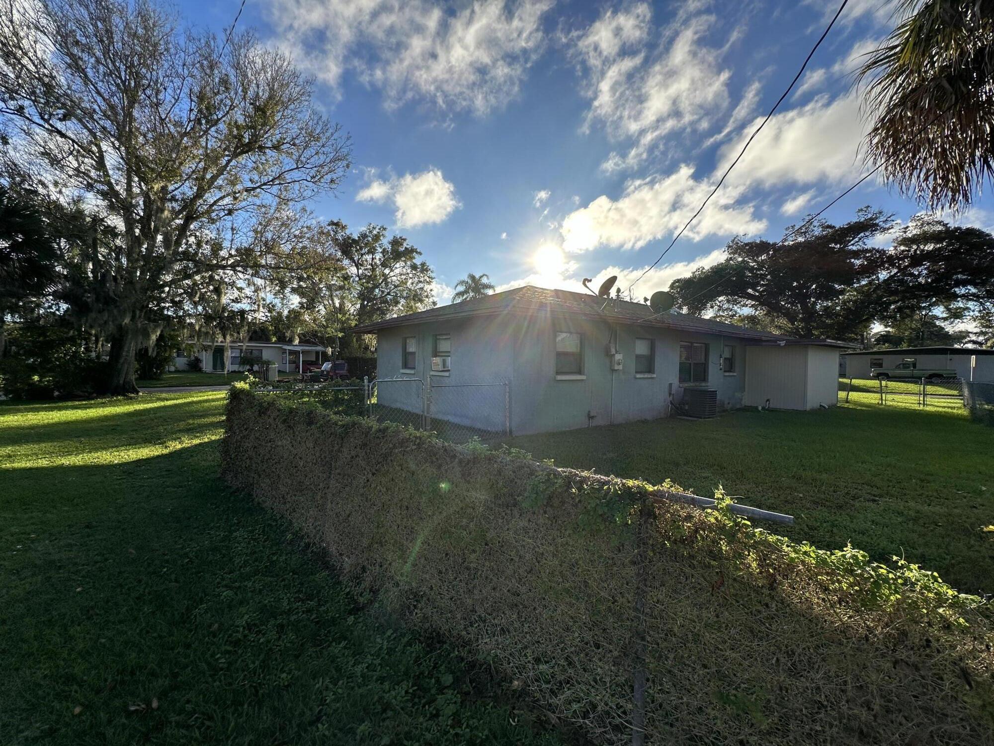 118 Explorer Street Cocoa, FL 32922 - Photo 3 of 19 a view of a house with a back yard