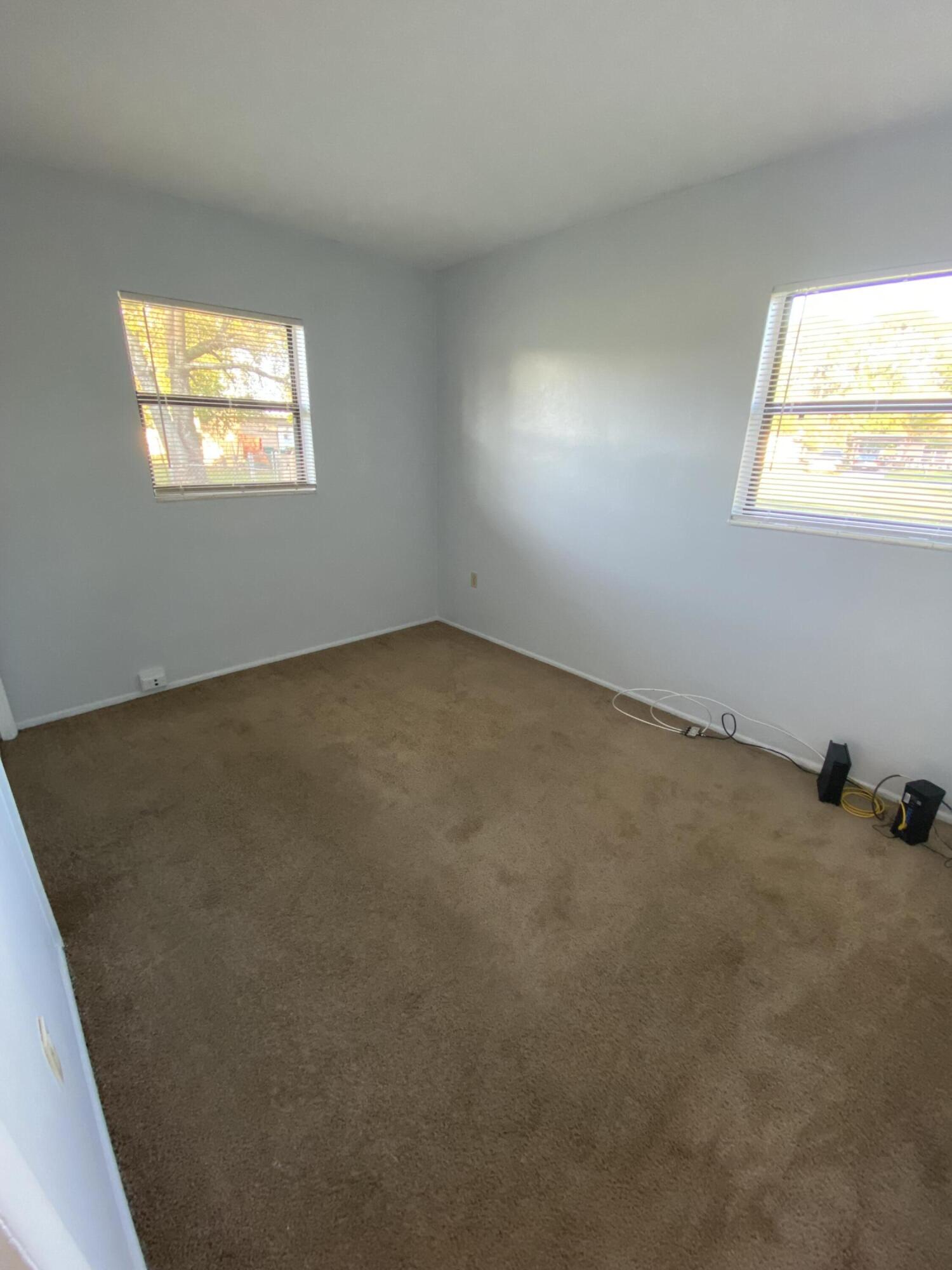 118 Explorer Street Cocoa, FL 32922 - Photo 10 of 19 an empty room with windows