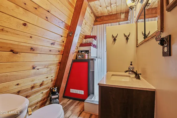 a bathroom with a tub and shower