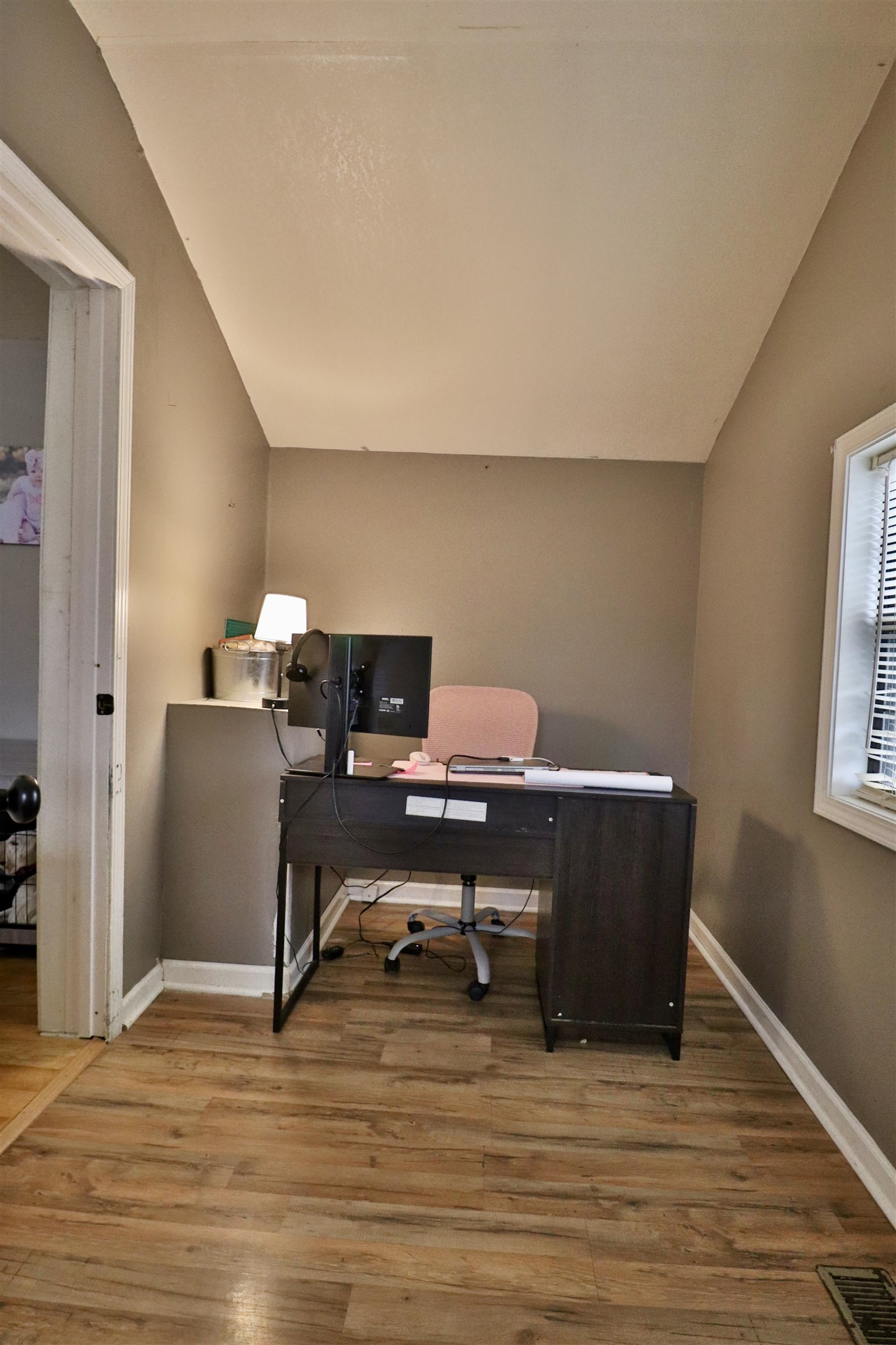 117 Charlie Ennis Road Dyersburg, TN 38024 - Photo 11 of 40 a view of a workspace with furniture and a window