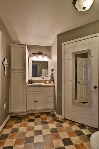 a room with a black white checkered floor