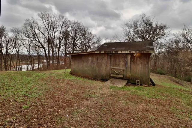 a backyard of a house with lots of green space