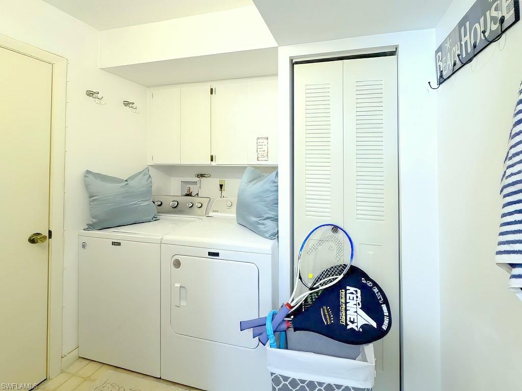 4085 Northlight Drive, Unit 5607 Naples, FL 34112 - Photo 35 of 49 a bathroom with a sink and a window