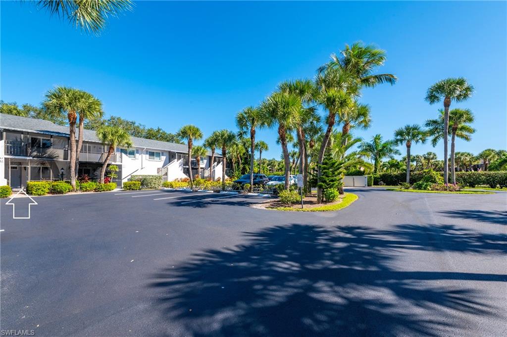 4085 Northlight Drive, Unit 5607 Naples, FL 34112 - Photo 39 of 49 a view of a street with houses