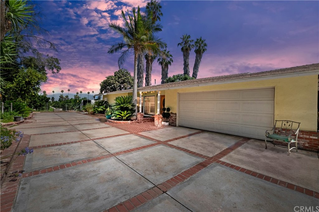 2595 Gibson Street Riverside, CA 92503 - Photo 1 of 1 a view of a house with a yard and garage