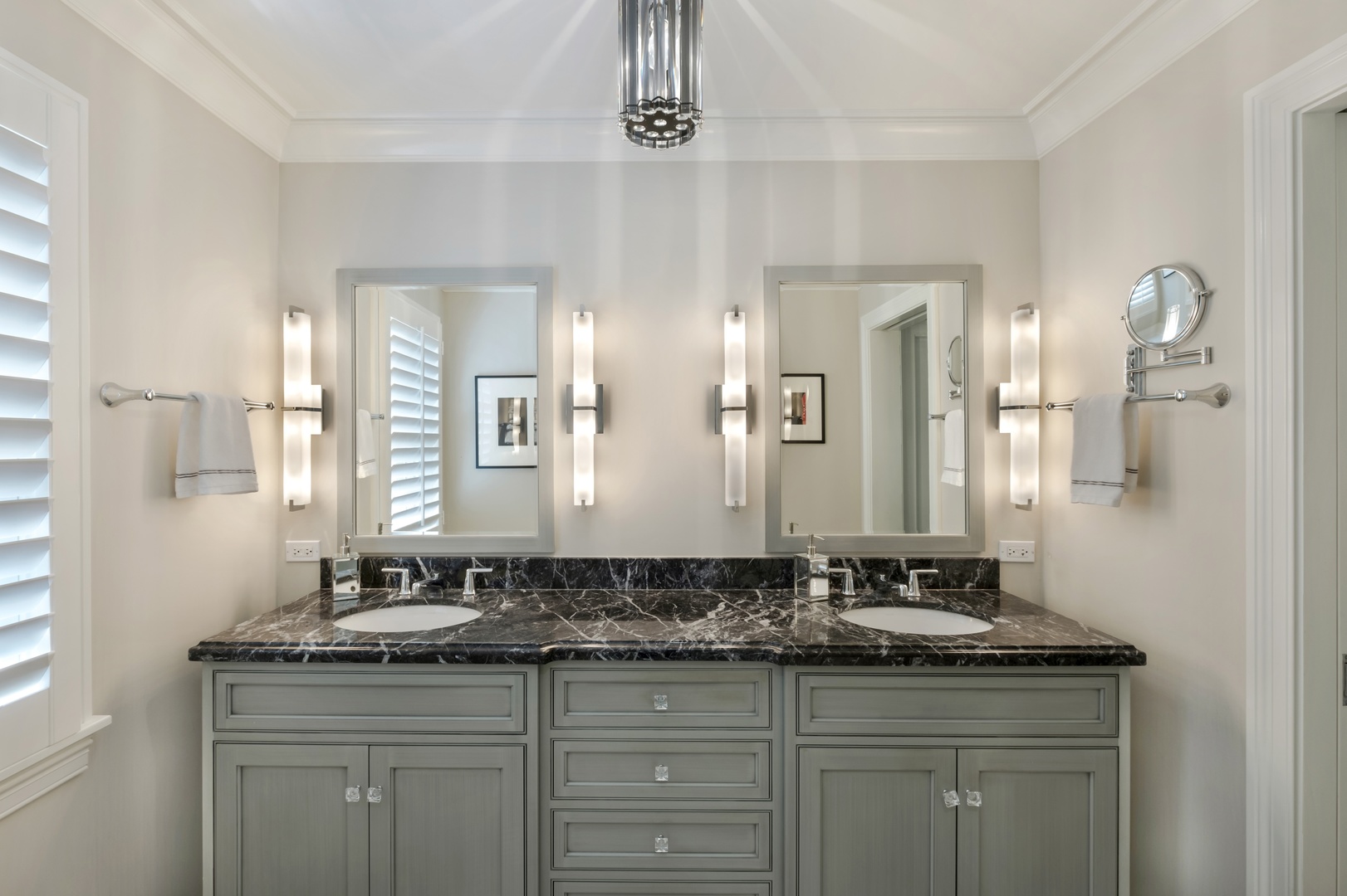 1029 Miami Road Wilmette, IL 60091 - Photo 14 of 28 a bathroom with a granite countertop sink a double vanity and a mirror