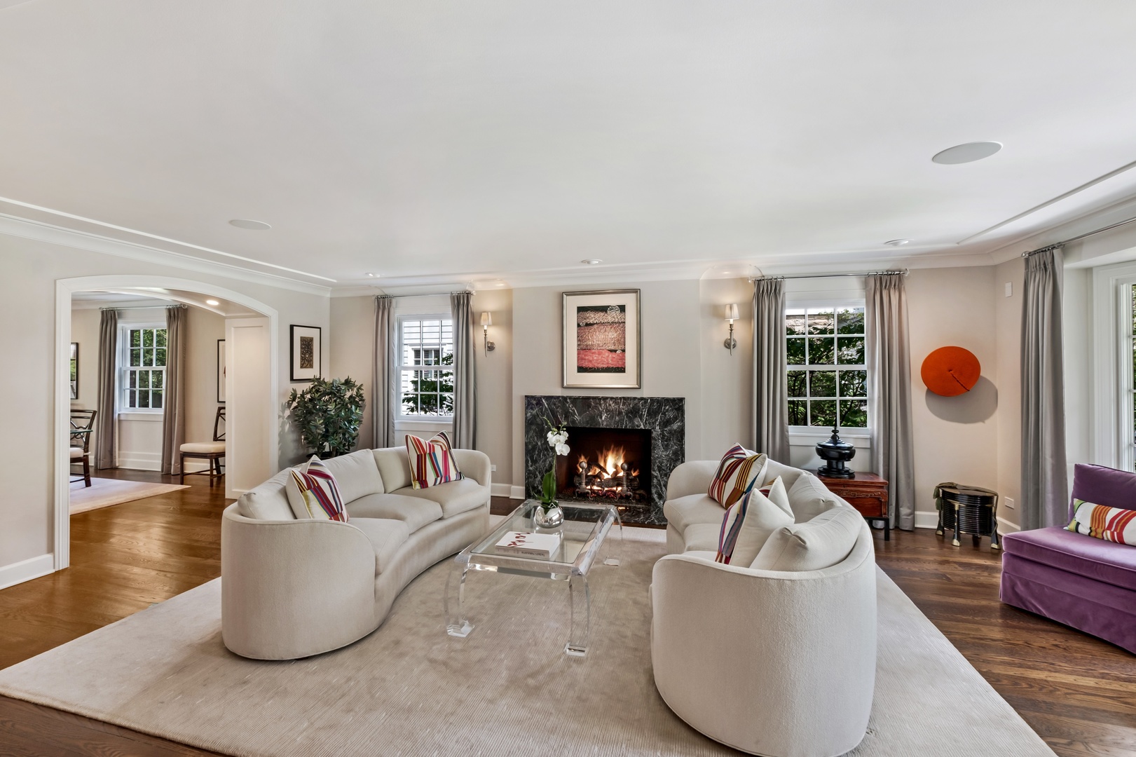 1029 Miami Road Wilmette, IL 60091 - Photo 3 of 28 a living room with furniture and a fireplace