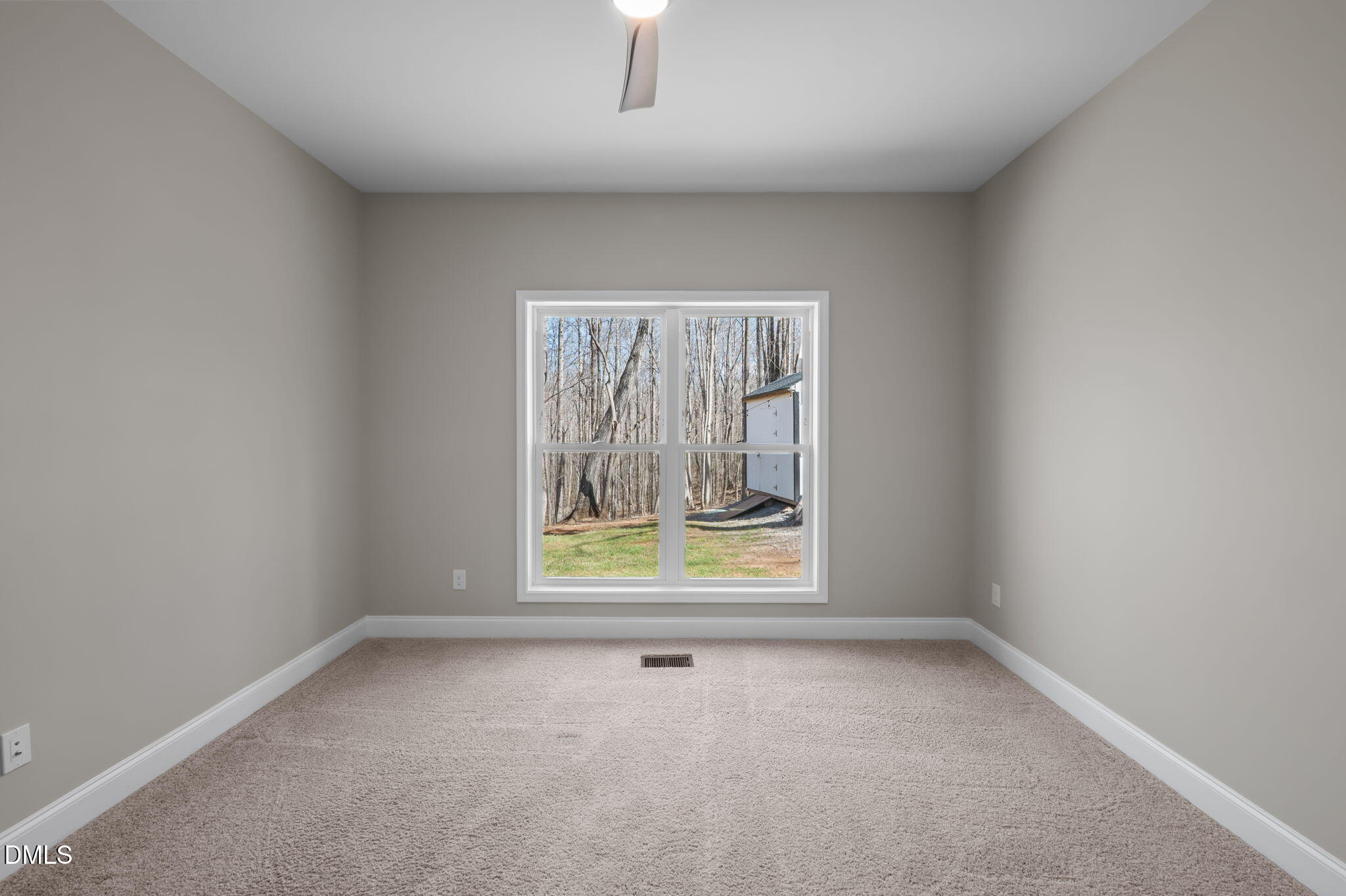 8514 Charlie Stovall Road Roxboro, NC 27574 - Photo 22 of 48 an empty room with window