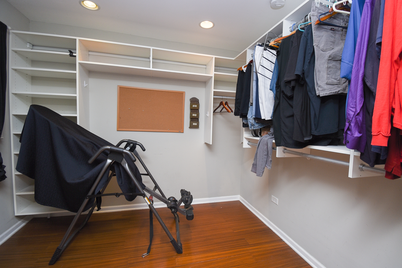 2106 20th Street Zion, IL 60099 - Photo 13 of 22 a view of walk in closet with clothes and shoes