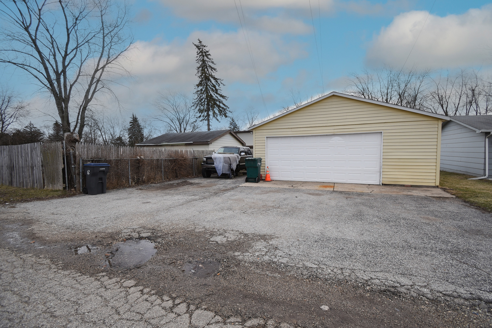 2106 20th Street Zion, IL 60099 - Photo 22 of 22 a view of a house with a yard and garage