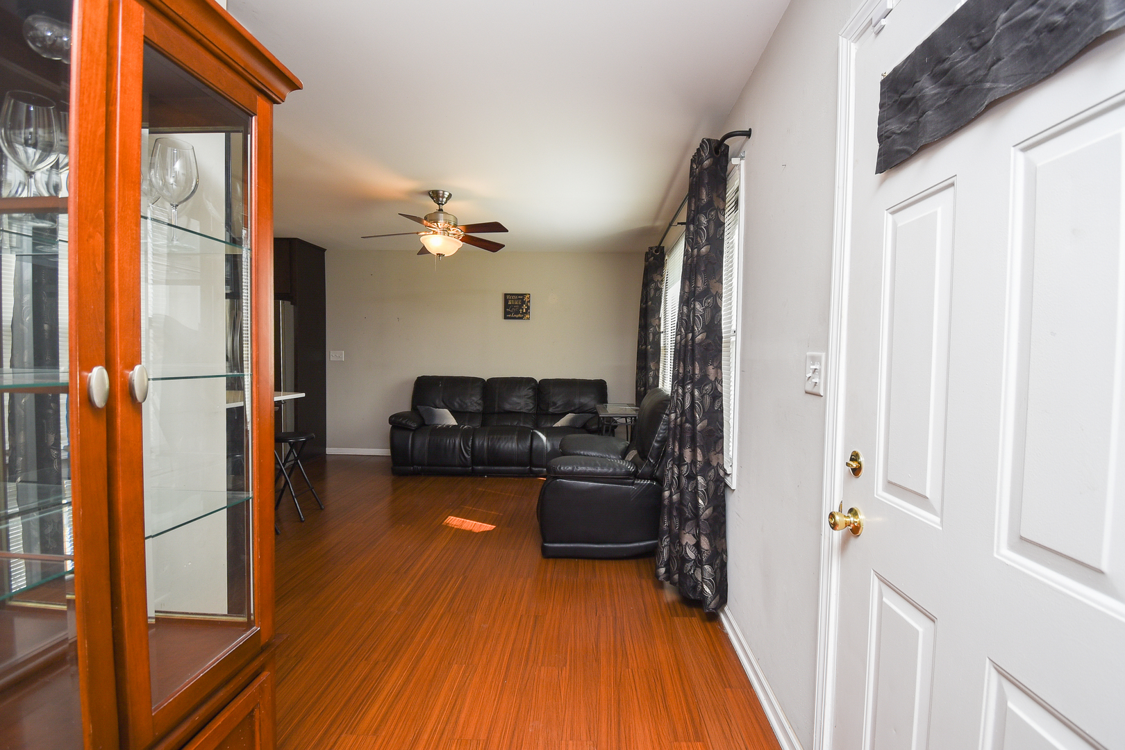 2106 20th Street Zion, IL 60099 - Photo 3 of 22 a view of a living room washer and dryer