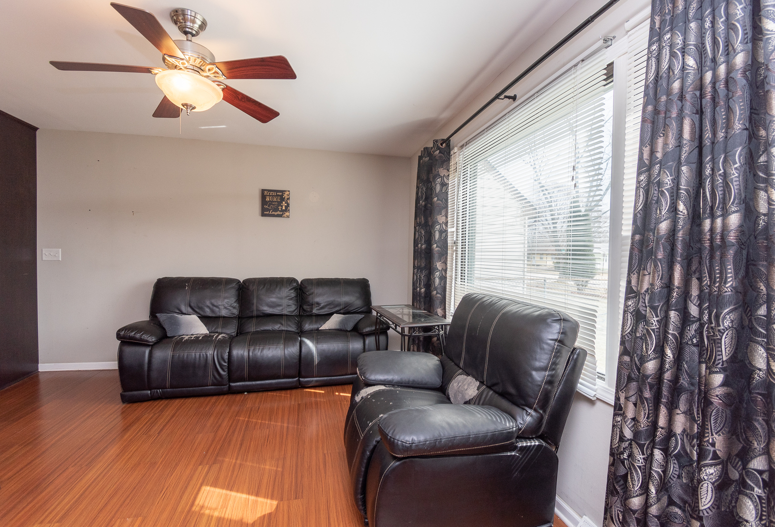 2106 20th Street Zion, IL 60099 - Photo 6 of 22 a living room with furniture and a large window