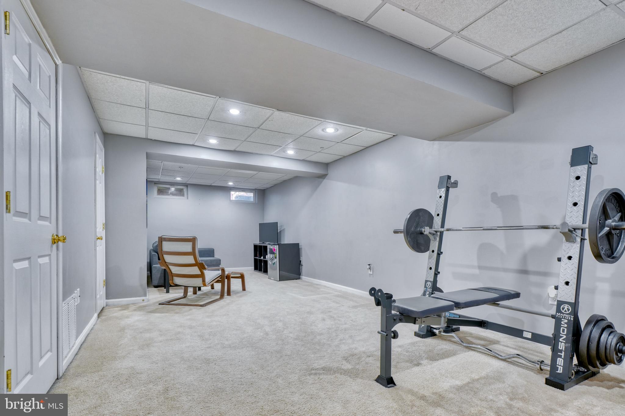 5030 Finsbury Road Rosedale, MD 21237 - Photo 40 of 49 a view of a room with gym equipment