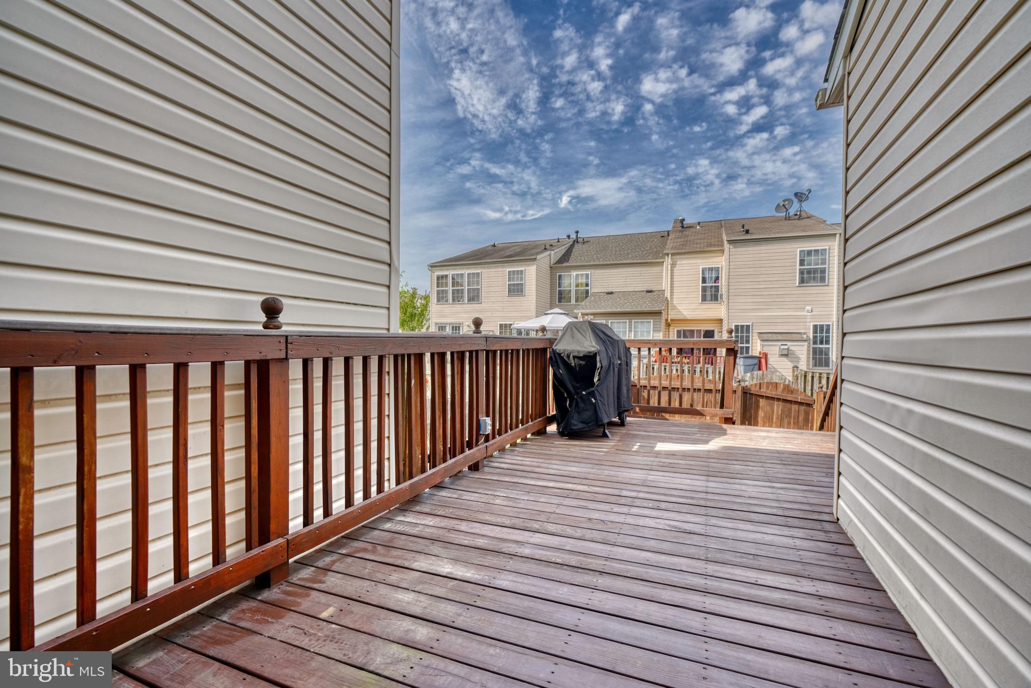5030 Finsbury Road Rosedale, MD 21237 - Photo 46 of 49 a view of a patio with wooden floor