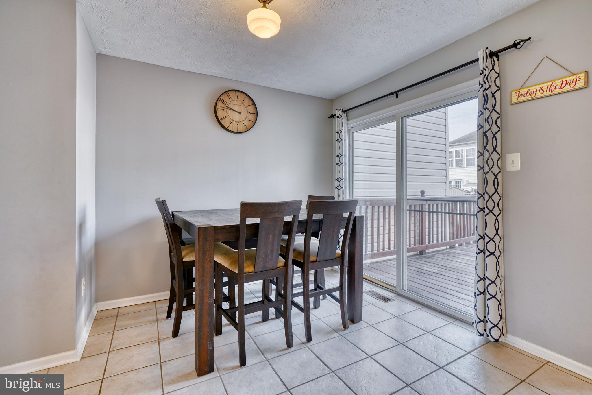 5030 Finsbury Road Rosedale, MD 21237 - Photo 10 of 49 a view of a dining room with furniture
