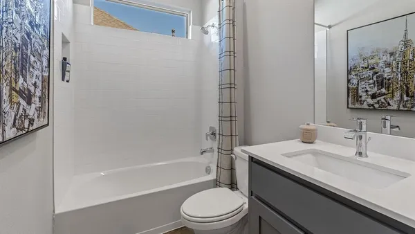 a bedroom with a bed and cupboard