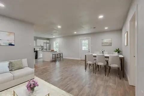 221 Braz Street Bonham, TX 75418 - Photo 5 of 12 Living room with light wood-style floors and recessed lighting