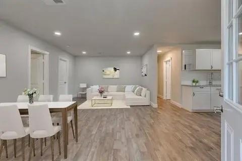 221 Braz Street Bonham, TX 75418 - Photo 7 of 12 Living area featuring light wood finished floors and recessed lighting