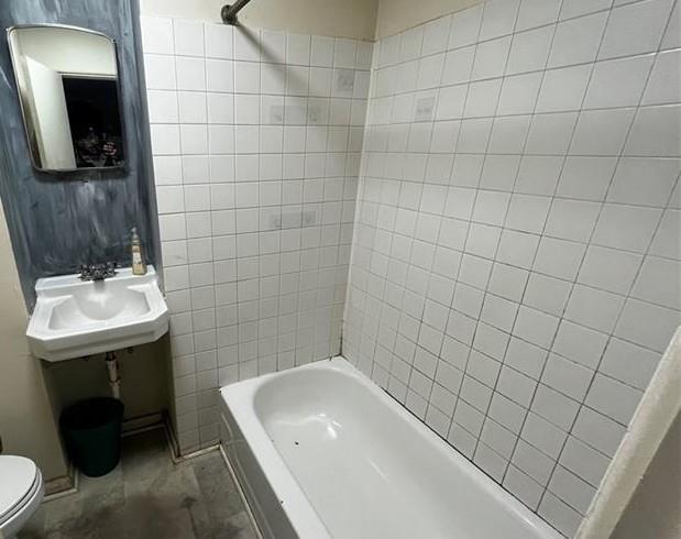 2918 Leander Street Pittsburgh, PA 15219 - Photo 9 of 9 a bathroom with a sink a toilet and mirror