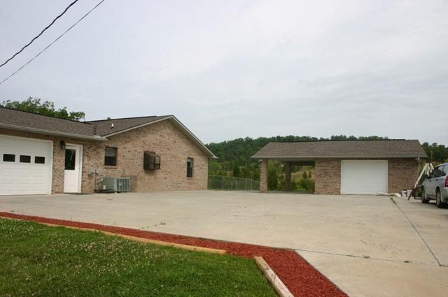 1120 Holbert Cemetery Road Sevierville, TN 37876 - Photo 3 of 35 workshop and driveway