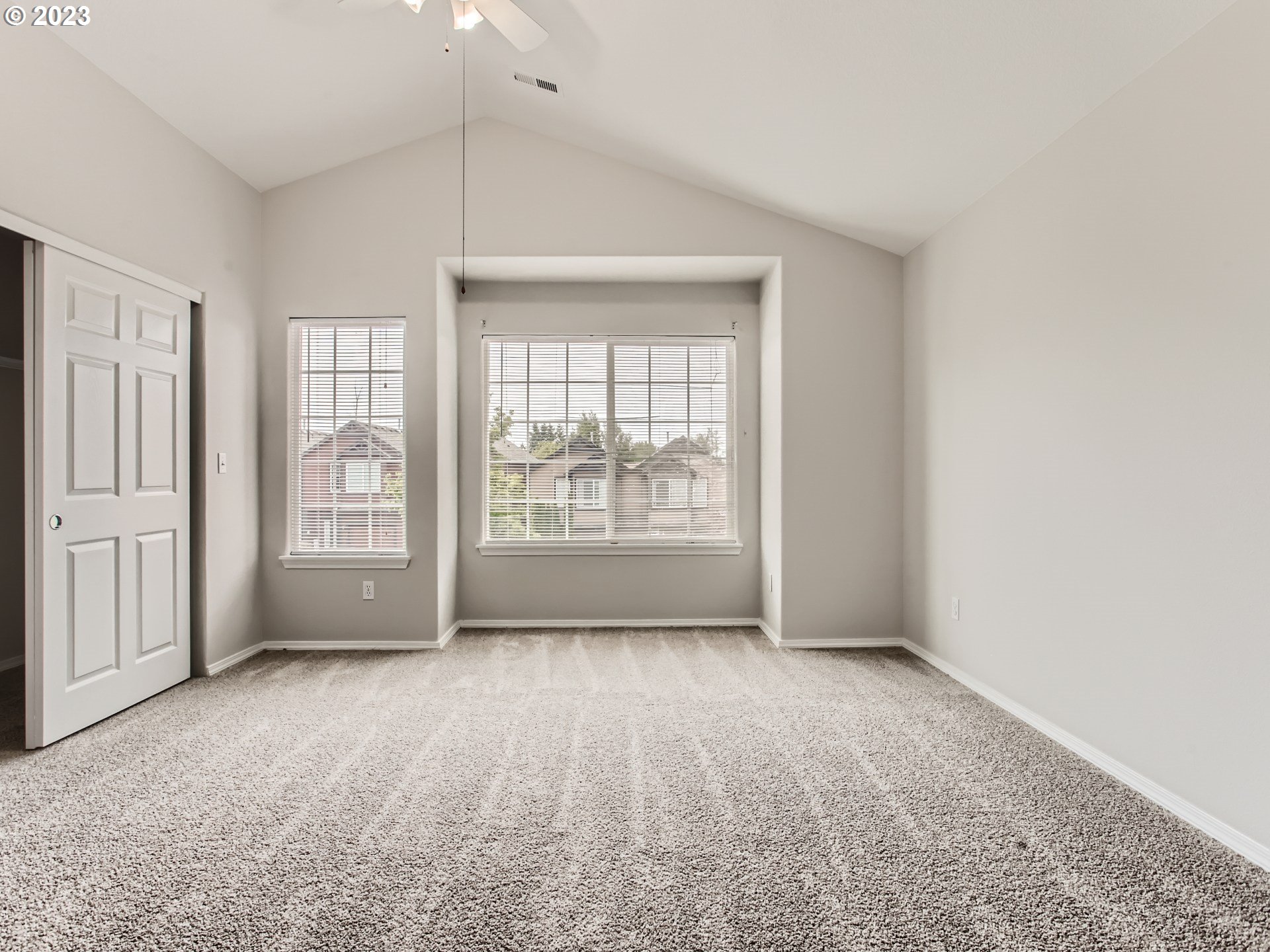 5877 Southeast 15th Drive Gresham, OR 97080 - Photo 13 of 27 a view of an empty room with a window
