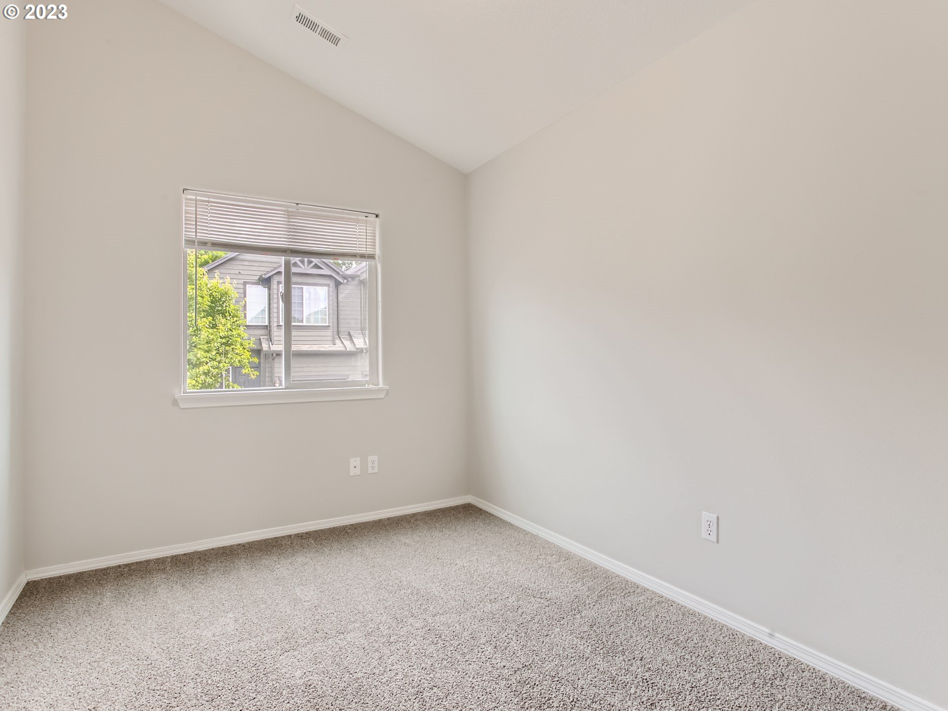 5877 Southeast 15th Drive Gresham, OR 97080 - Photo 18 of 27 an empty room with a window