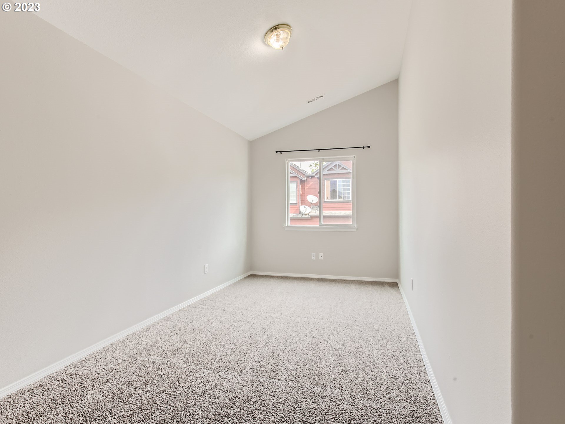 5877 Southeast 15th Drive Gresham, OR 97080 - Photo 20 of 27 an empty room with windows