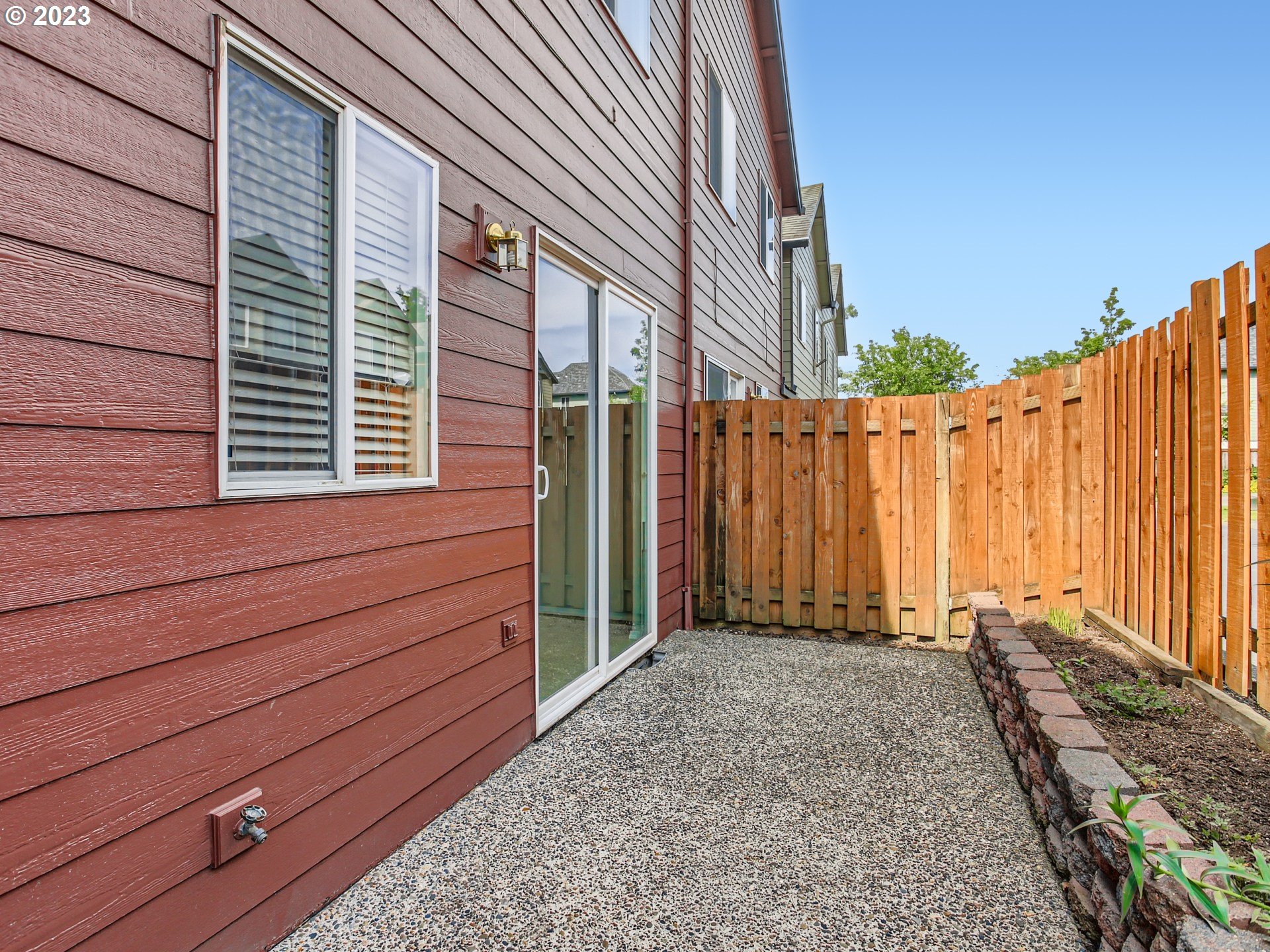 5877 Southeast 15th Drive Gresham, OR 97080 - Photo 27 of 27 a view of a house with a backyard