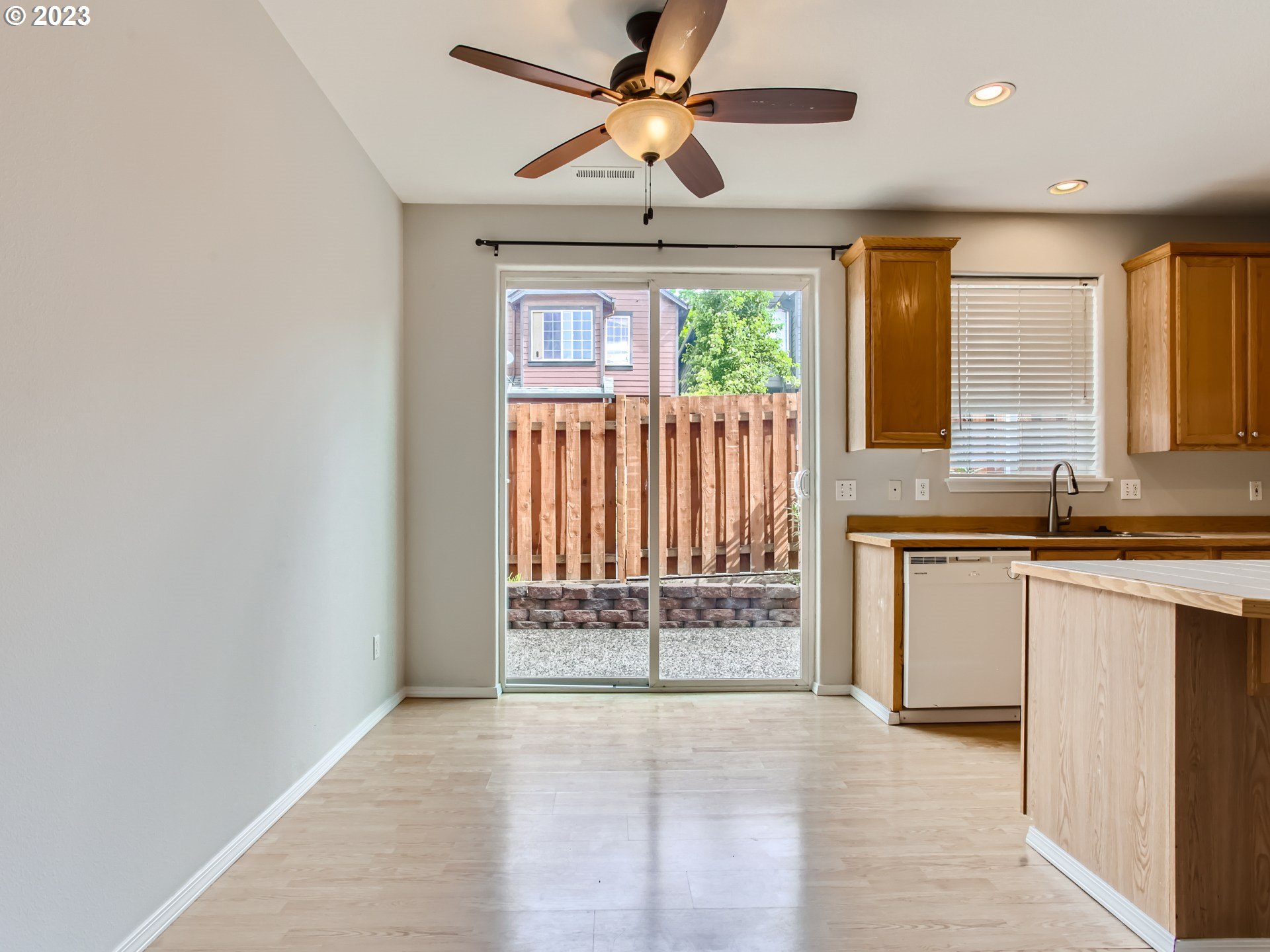 5877 Southeast 15th Drive Gresham, OR 97080 - Photo 8 of 27 a view of a kitchen with a sink and a window