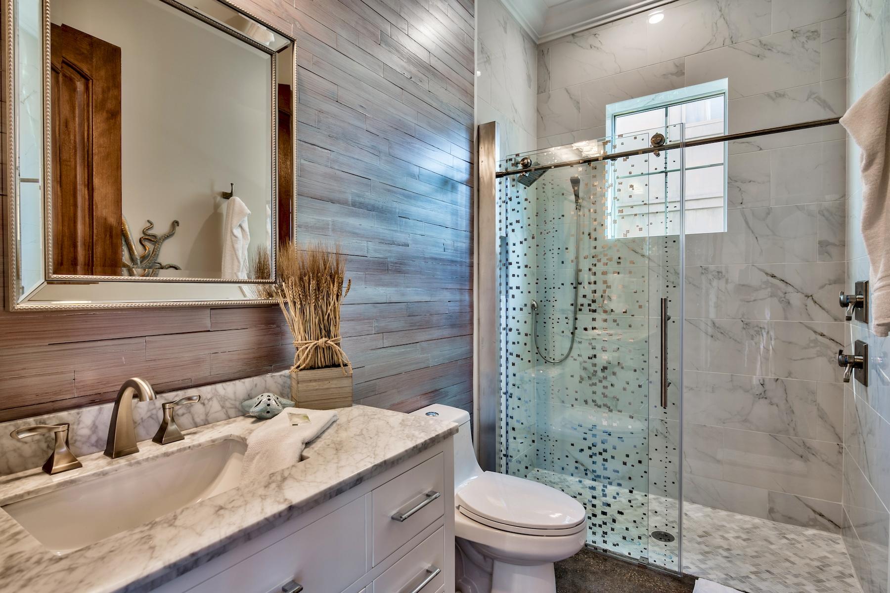 231 Rue St Tropez Miramar Beach, FL 32550 - Photo 11 of 35 a bathroom with a granite countertop sink toilet and shower