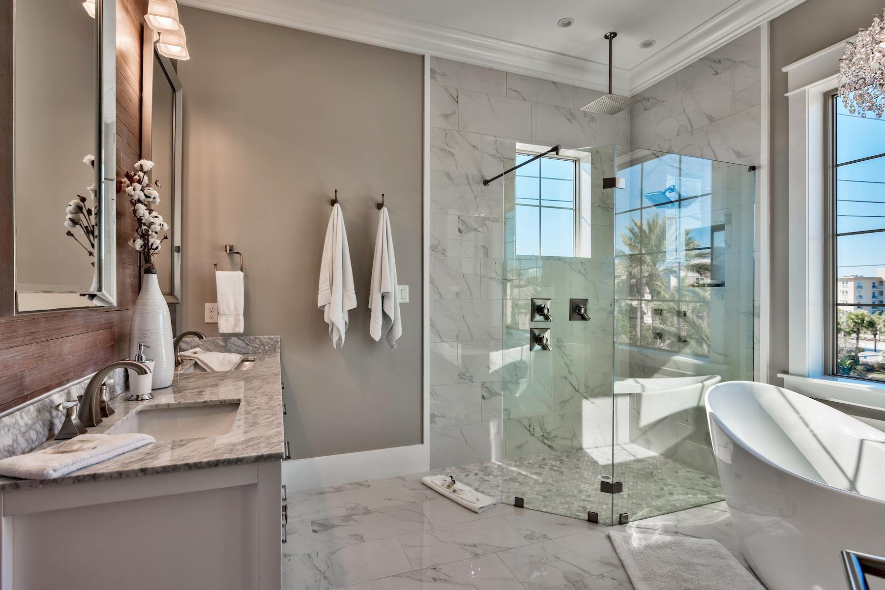 231 Rue St Tropez Miramar Beach, FL 32550 - Photo 25 of 35 a bathroom with a granite countertop sink a mirror and shower