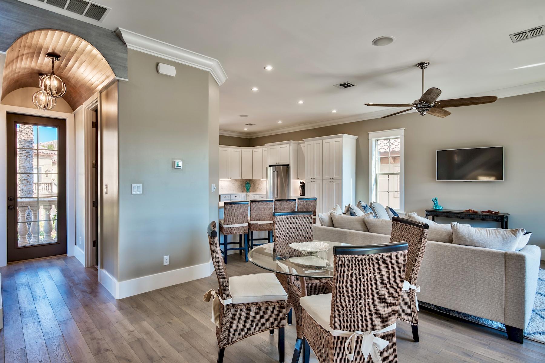 231 Rue St Tropez Miramar Beach, FL 32550 - Photo 7 of 35 a living room with fireplace furniture and a flat screen tv