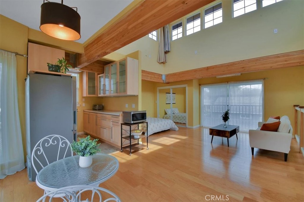 1631 Salem Street Chico, CA 95928 - Photo 44 of 71 a living room with furniture kitchen view and a large window