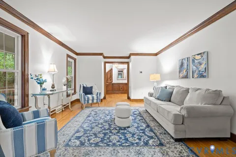 a living room with furniture and a couch