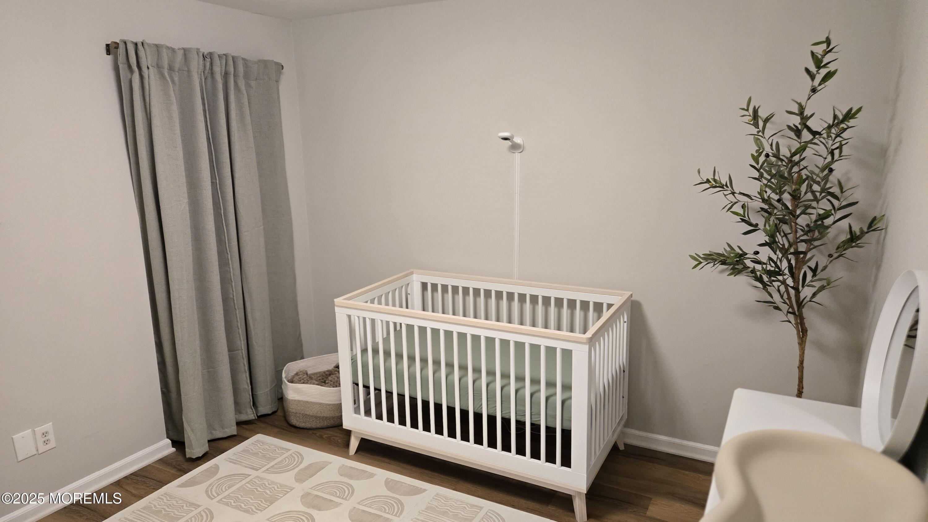 3 Primrose Lane Brick, NJ 08724 - Photo 5 of 8 a view of a room with a window and wooden floor