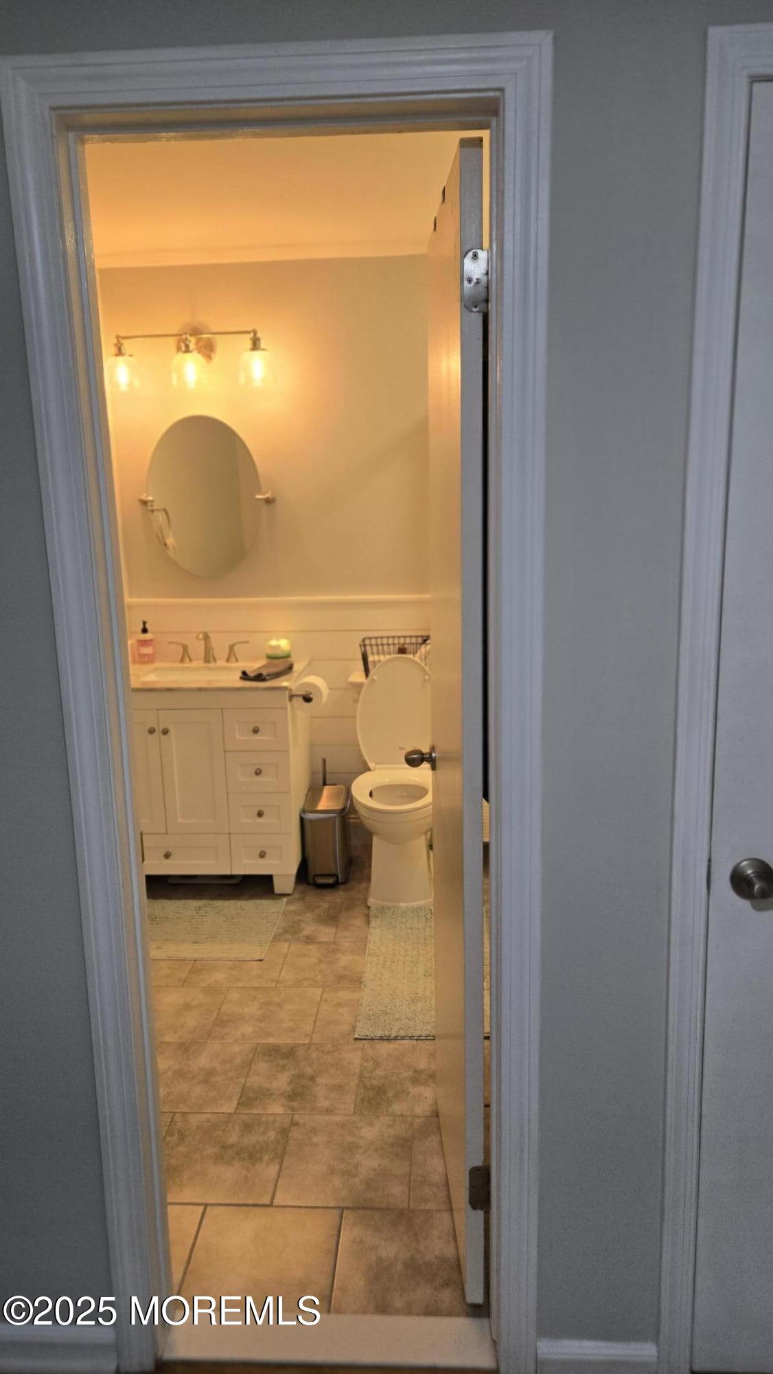3 Primrose Lane Brick, NJ 08724 - Photo 7 of 8 a view of a bathroom with a tub and a shower