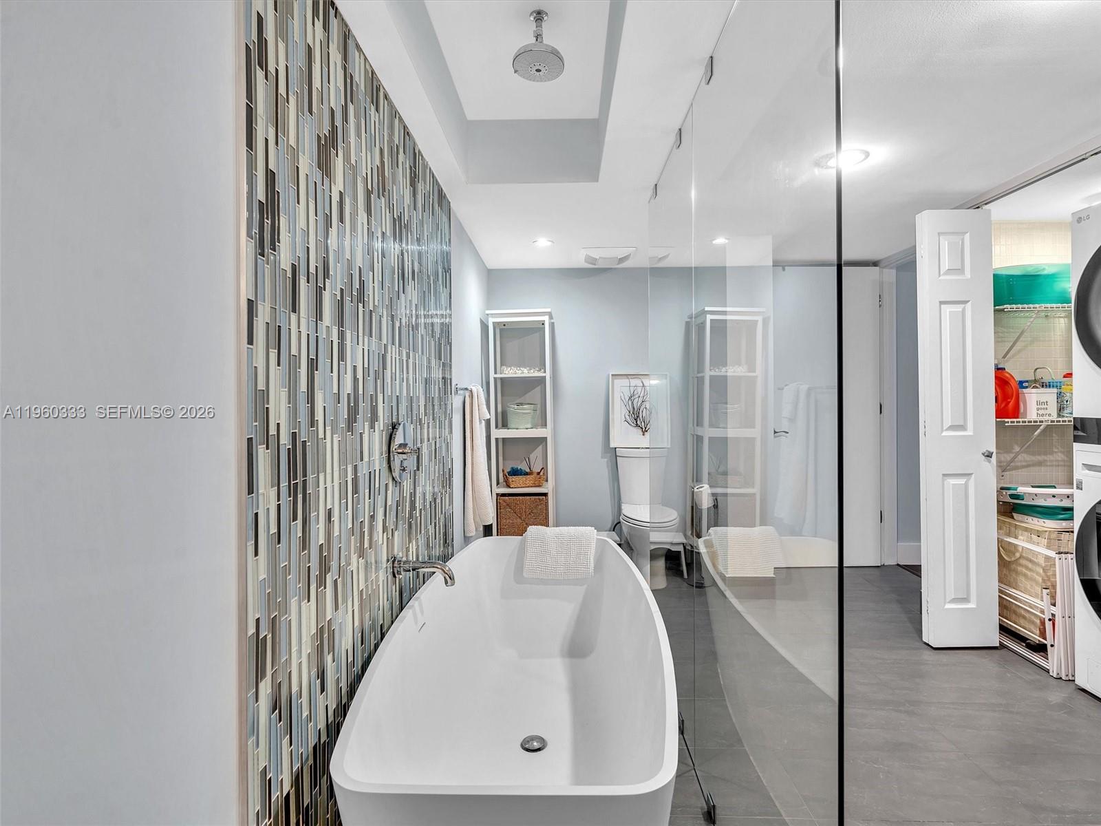 6423 Collins Avenue, Unit 409 Miami Beach, FL 33141 - Photo 40 of 61 a very nice looking room with a large window