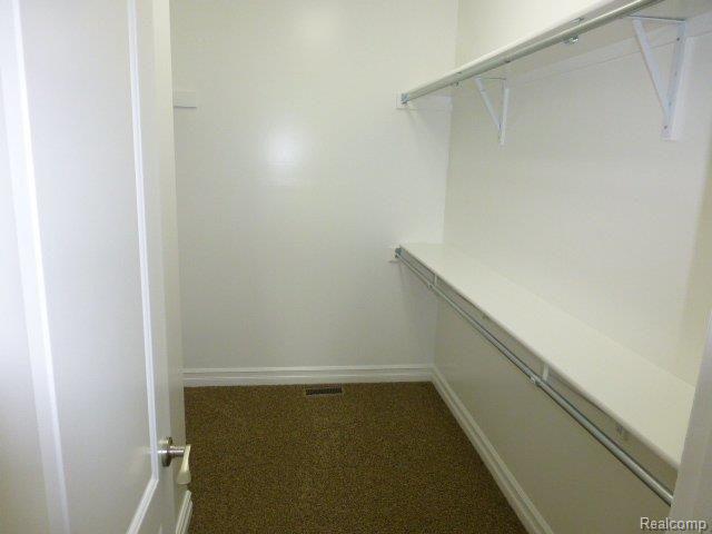 9295 Morrish Road Swartz Creek, MI 48473 - Photo 13 of 21 Spacious Master Walkin Closet.JP