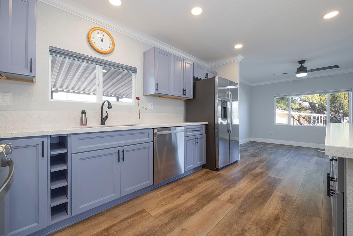 1330 Calaveritas Road, Unit 25 San Andreas, CA 95249 - Photo 13 of 43 a kitchen with a sink cabinets stainless steel appliances and window
