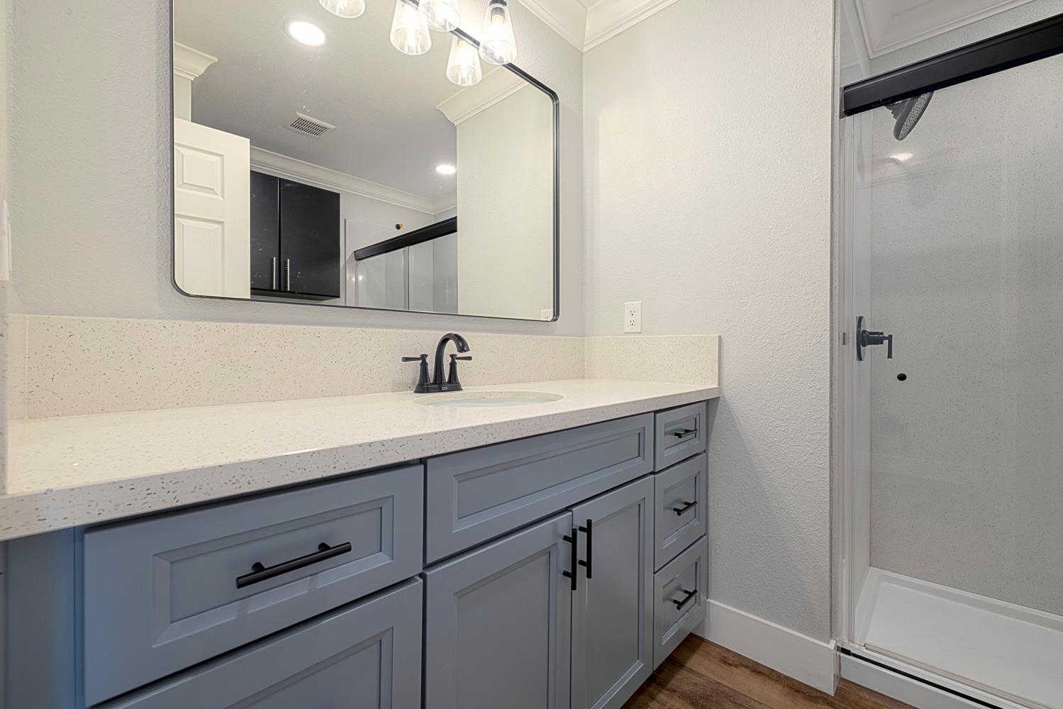 1330 Calaveritas Road, Unit 25 San Andreas, CA 95249 - Photo 19 of 43 a bathroom with a double vanity sink mirror and