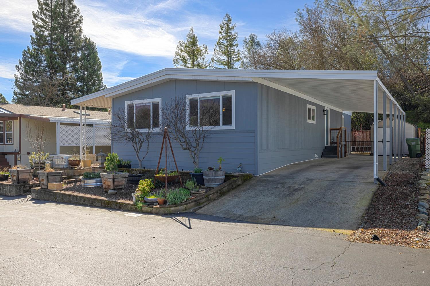 1330 Calaveritas Road, Unit 25 San Andreas, CA 95249 - Photo 2 of 43 a view of a house with a patio