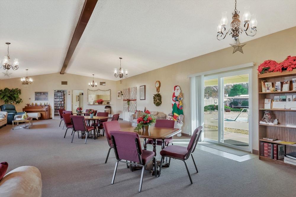 1330 Calaveritas Road, Unit 25 San Andreas, CA 95249 - Photo 35 of 43 a view of a dining room with furniture and a chandelier