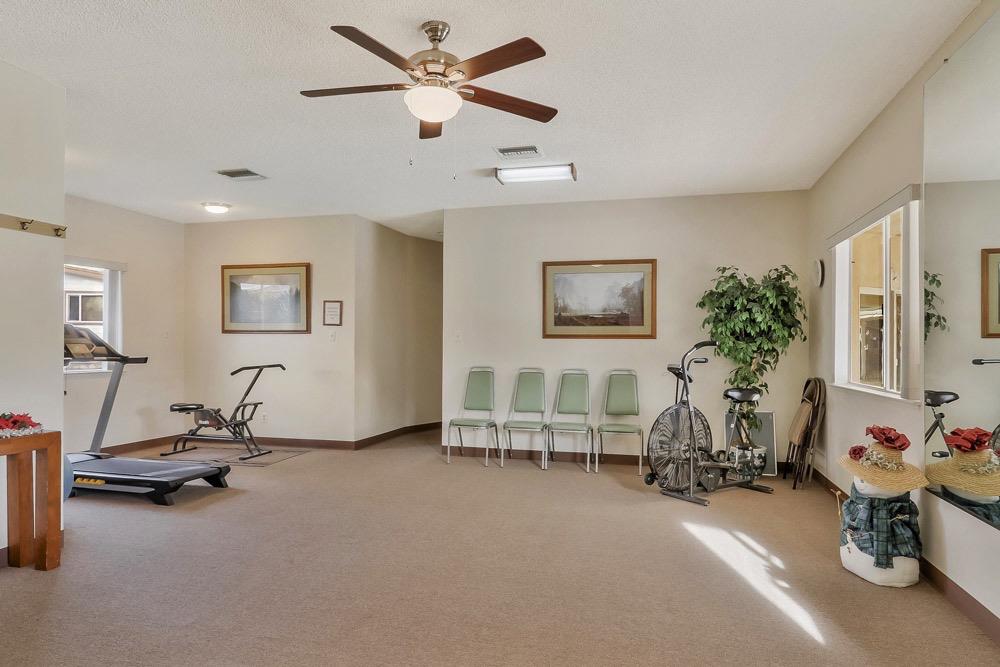 1330 Calaveritas Road, Unit 25 San Andreas, CA 95249 - Photo 37 of 43 a view of a livingroom with furniture and a ceiling fan